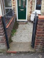 The brief was to create a ramped path with a level area by the front door for wheelchair access